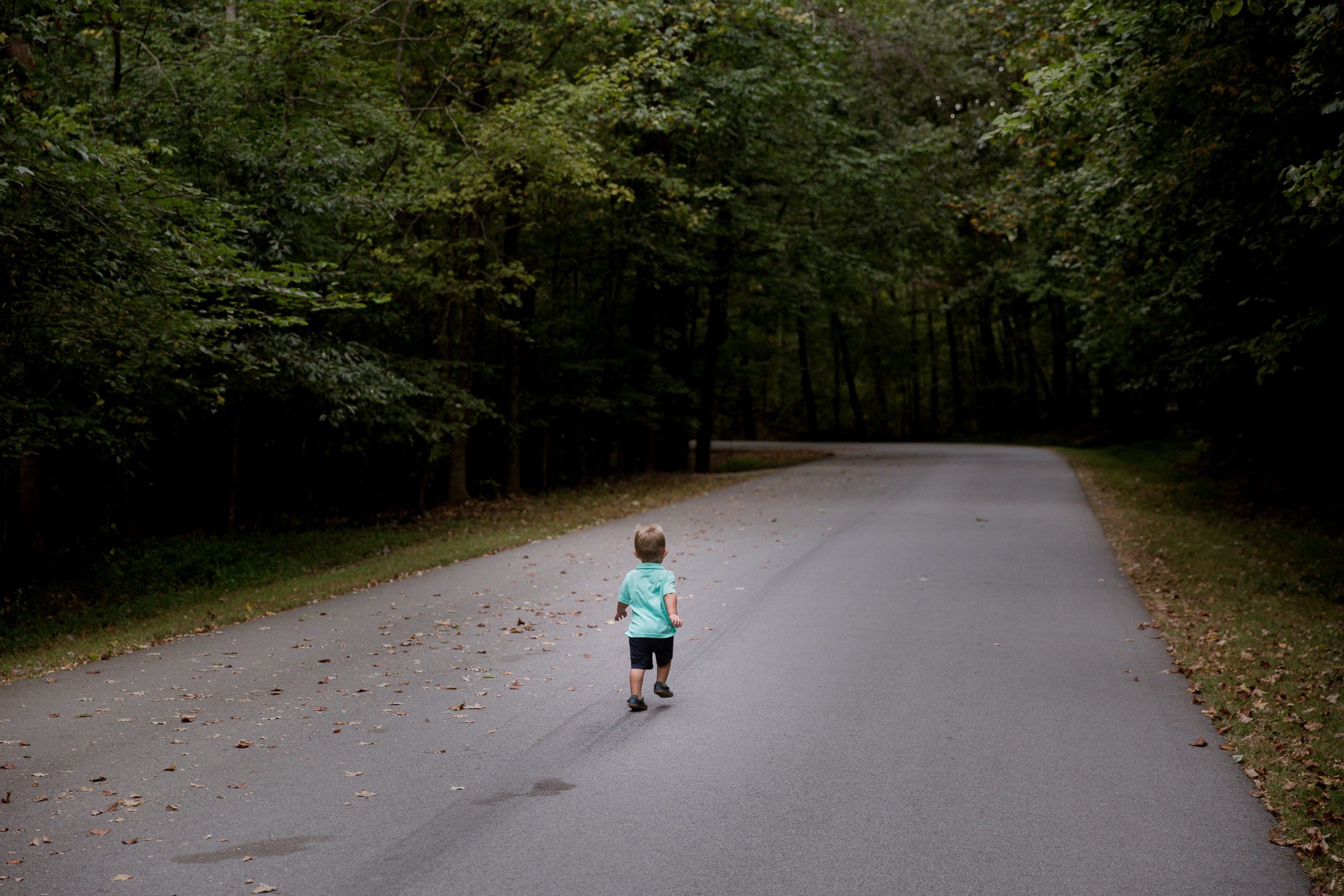 toddler running in the wild